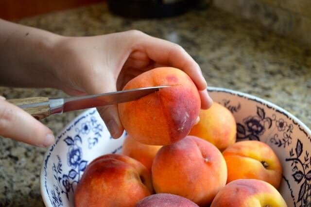 Peach Pie Recipe - peeling peaches, by thewoksoflife.com