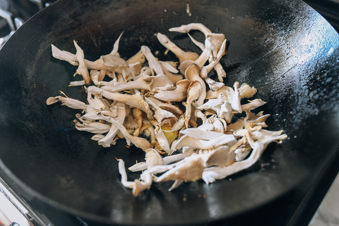 Oyster mushrooms in wok