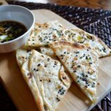 Scallion pancakes with sesame seeds and dipping sauce