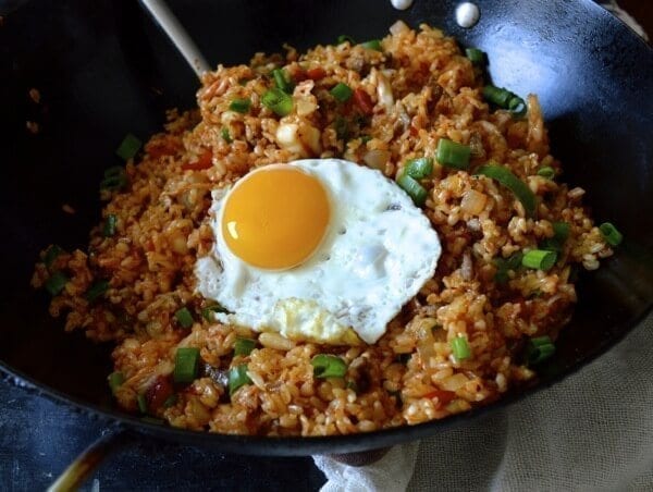 Egg on top of Beef and Kimchi Fried Rice, by thewoksoflife.com