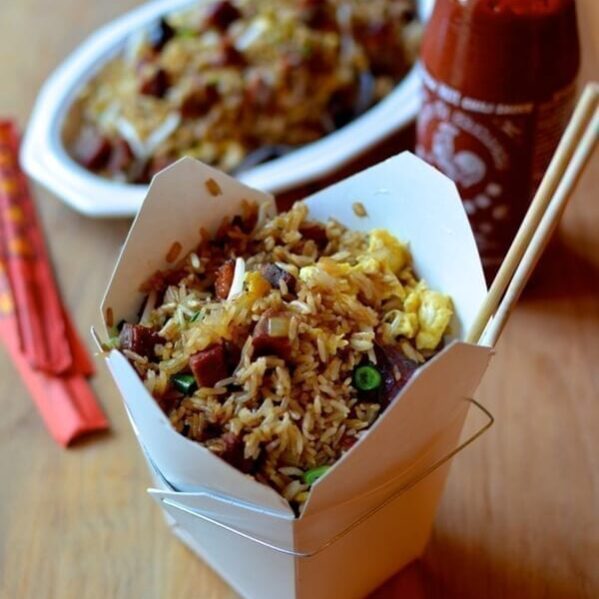 Pork fried rice in takeout container