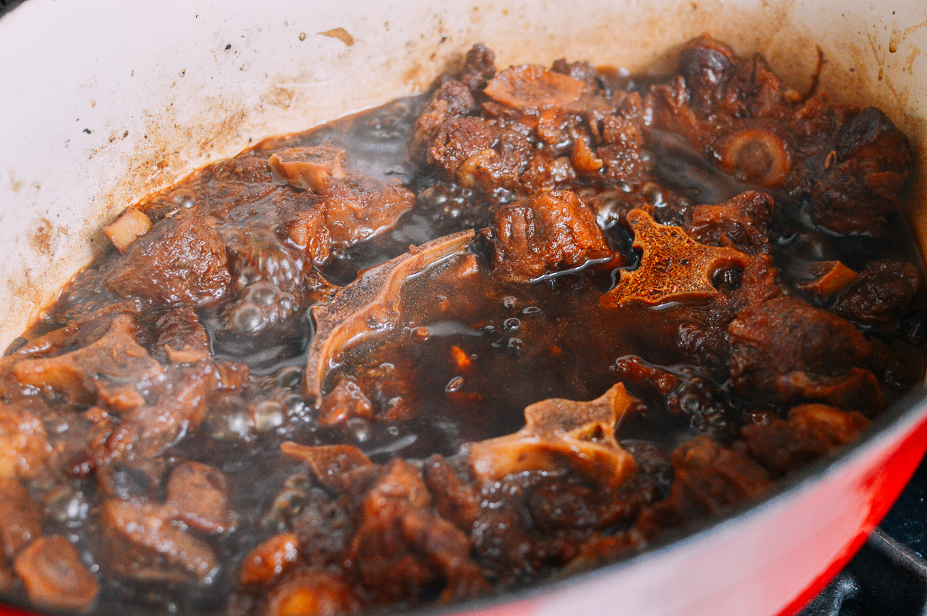 Simmering Chinese oxtail braise