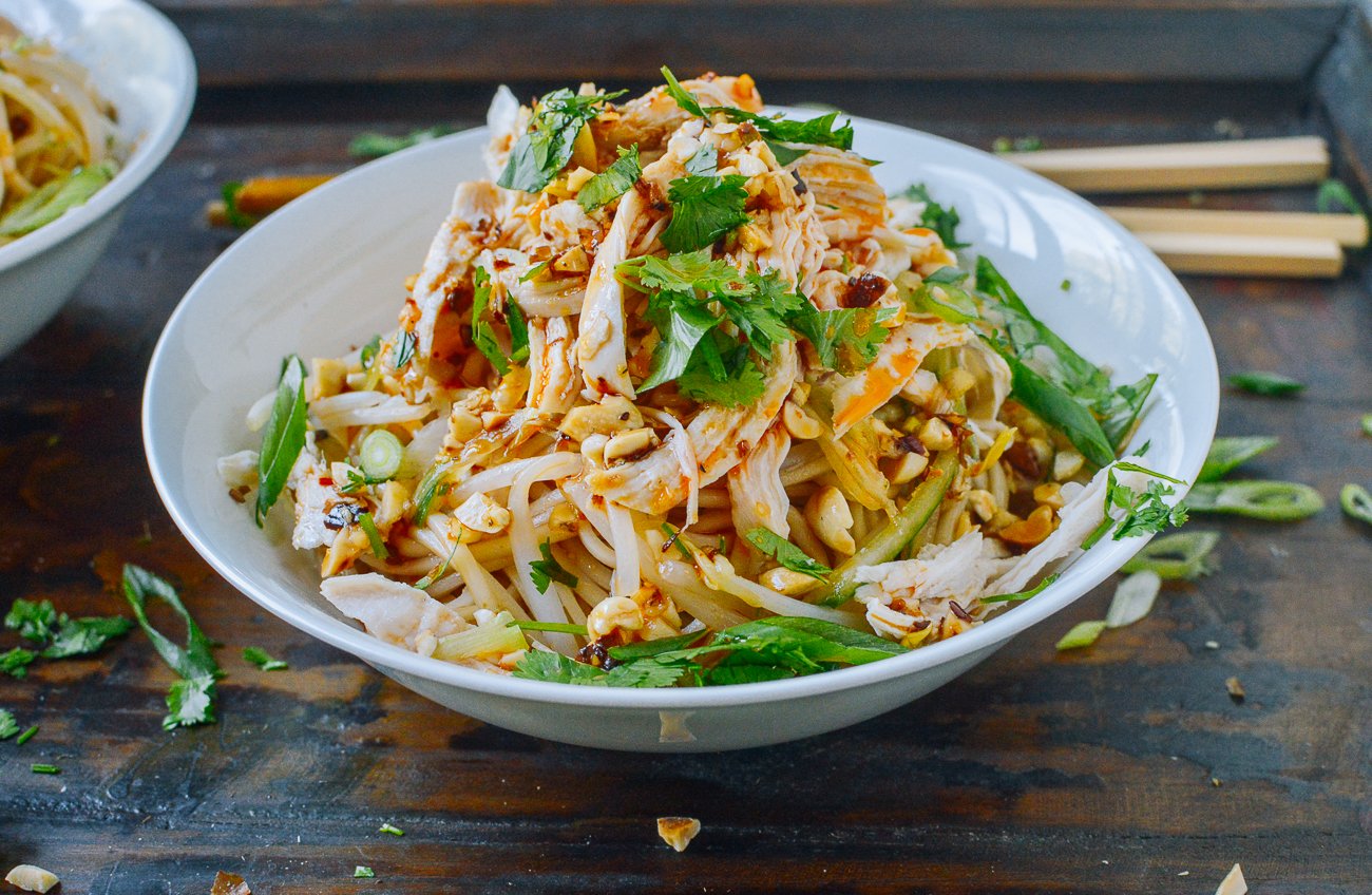 bowl of cold noodles with shredded chicken