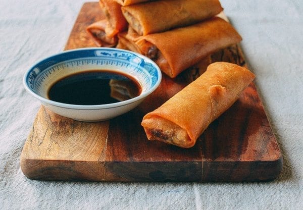 Homemade Spring Rolls with dipping sauce, by thewoksoflife.com