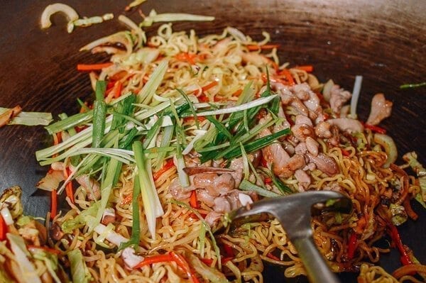 Cooking yakisoba noodles with chicken and vegetables, by thewoksoflife.com