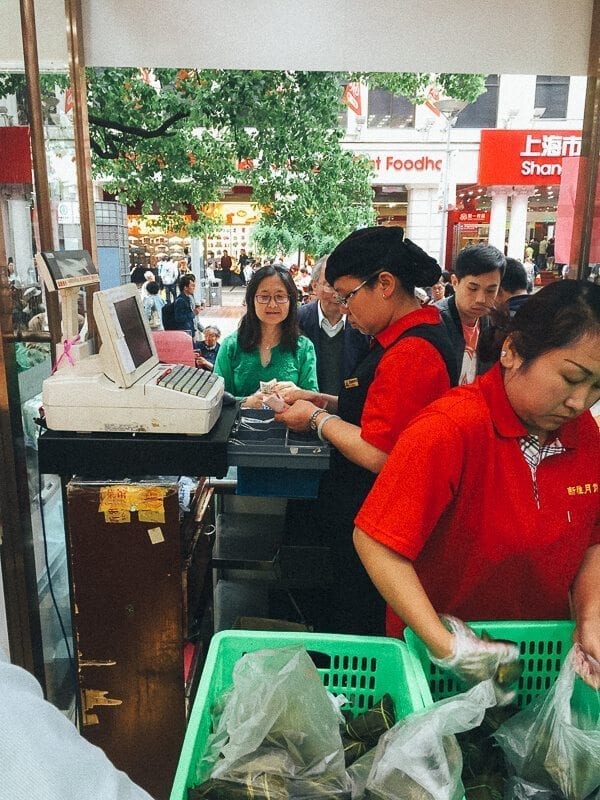 Judy paying for zongzi in Shanghai  by thewoksoflife.com