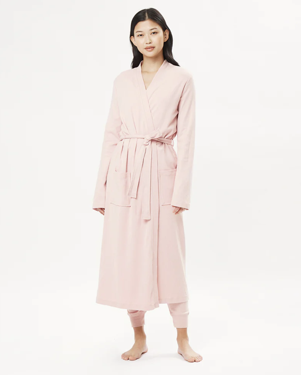 Pink organic cotton robe worn by an Asian model 