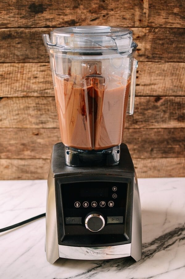 vitamix blender with smooth chocolate mixture inside 