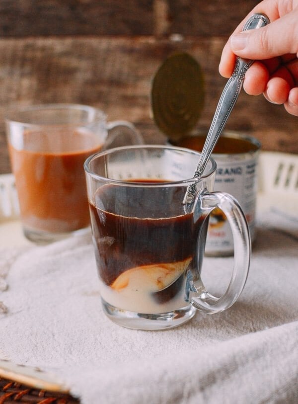 Stir A Spoon In The Mug To Cool Down the Coffee