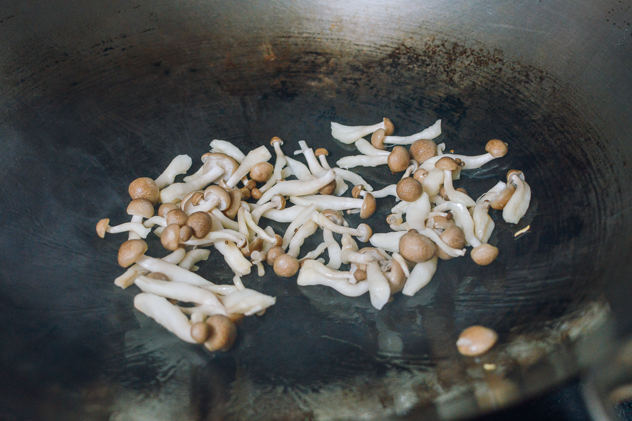 beech mushrooms in wok