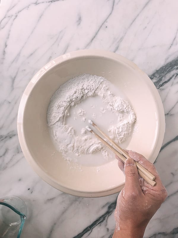 stirring rice flour and water with chopstick, by thewoksoflife.com