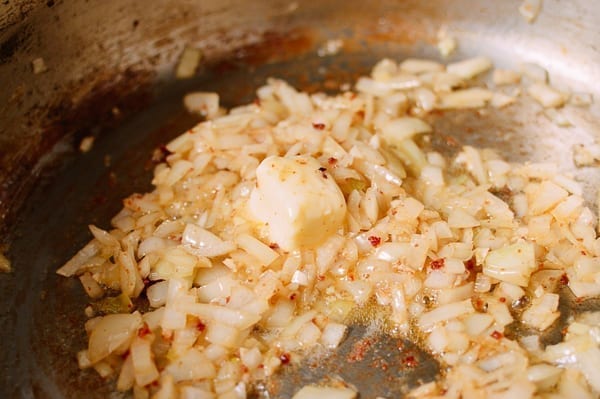 Butter and onions in pan, thewoksoflife.com