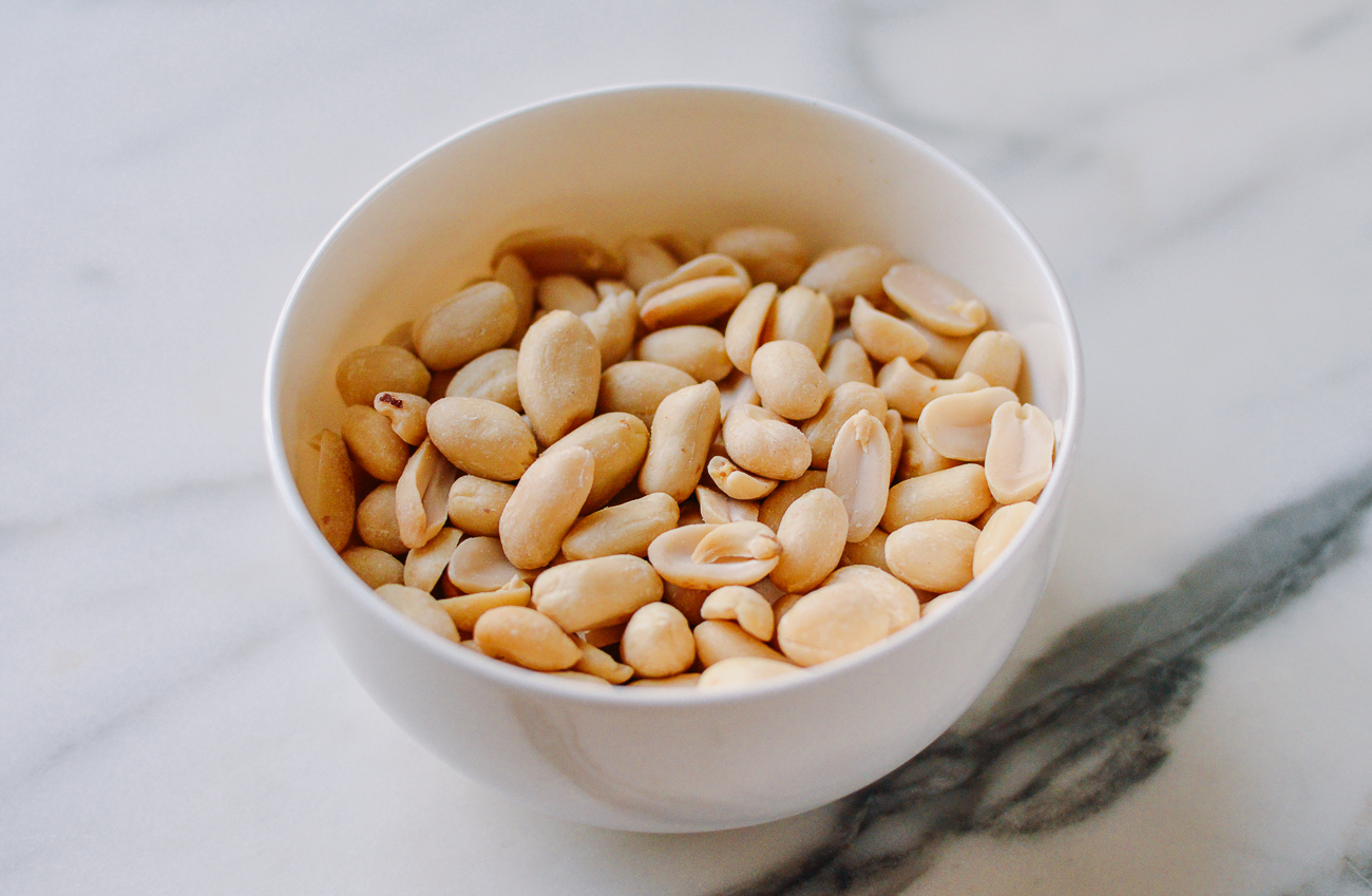 bowl of raw skinless peanuts