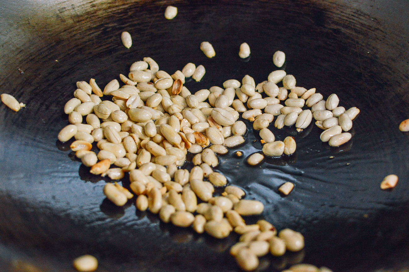 roasting peanuts in wok