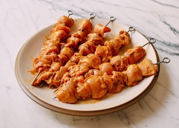 Chicken Satay skewers before cooking, thewoksoflife.com