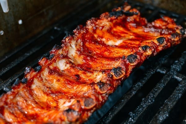 Grilling BBQ ribs, thewoksoflife.com