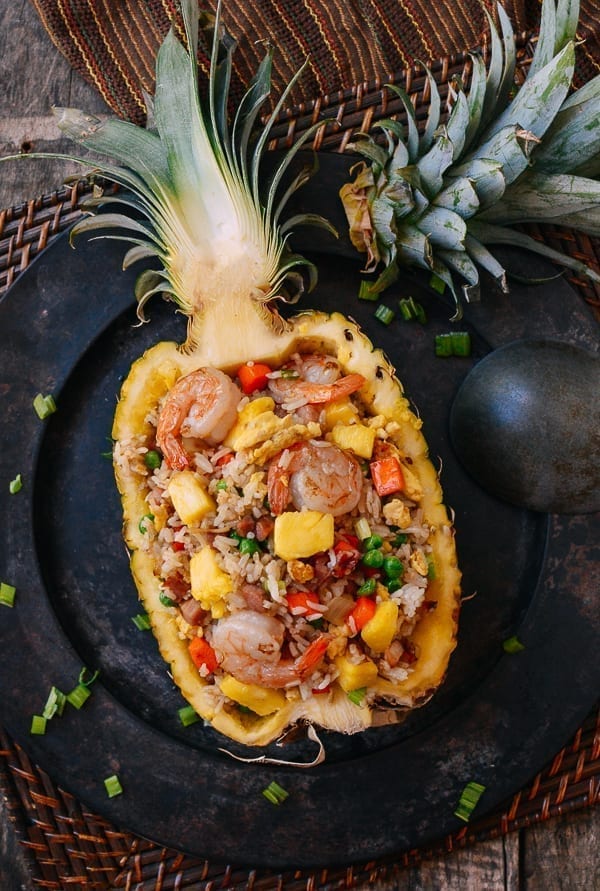 Pineapple fried rice served in a hollowed out pineapple, thewoksoflife.com