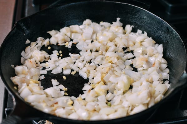 Cooking onions in pan, thewoksoflife.com