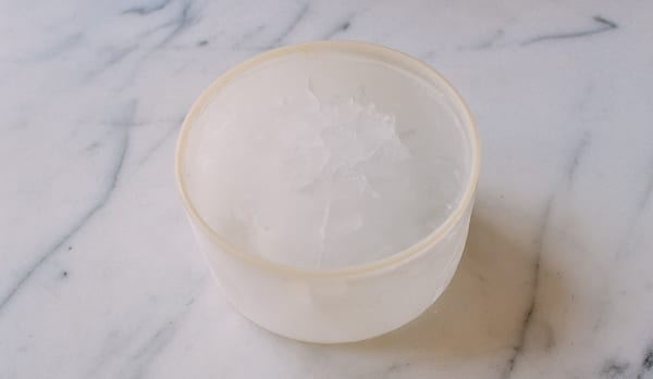 Frozen ice in container, thewoksoflife.com