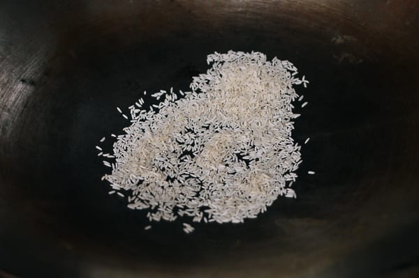 Toasting jasmine rice in wok, thewoksoflife.com