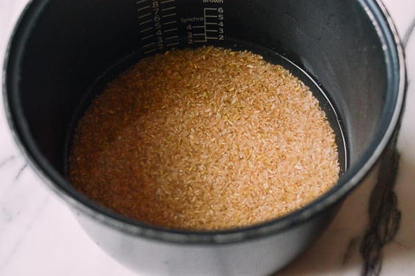 Brown rice in rice cooker pot, thewoksoflife.com