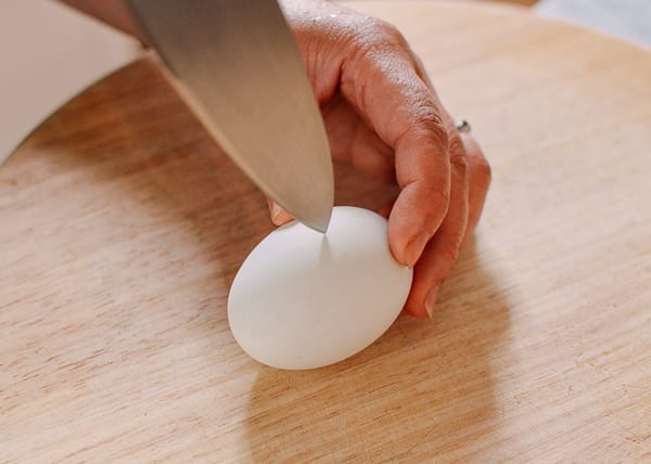 Cutting open a salted duck egg, thewoksoflife.com