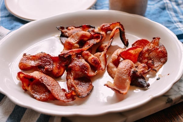 Cooked bacon on a plate, thewoksoflife.com