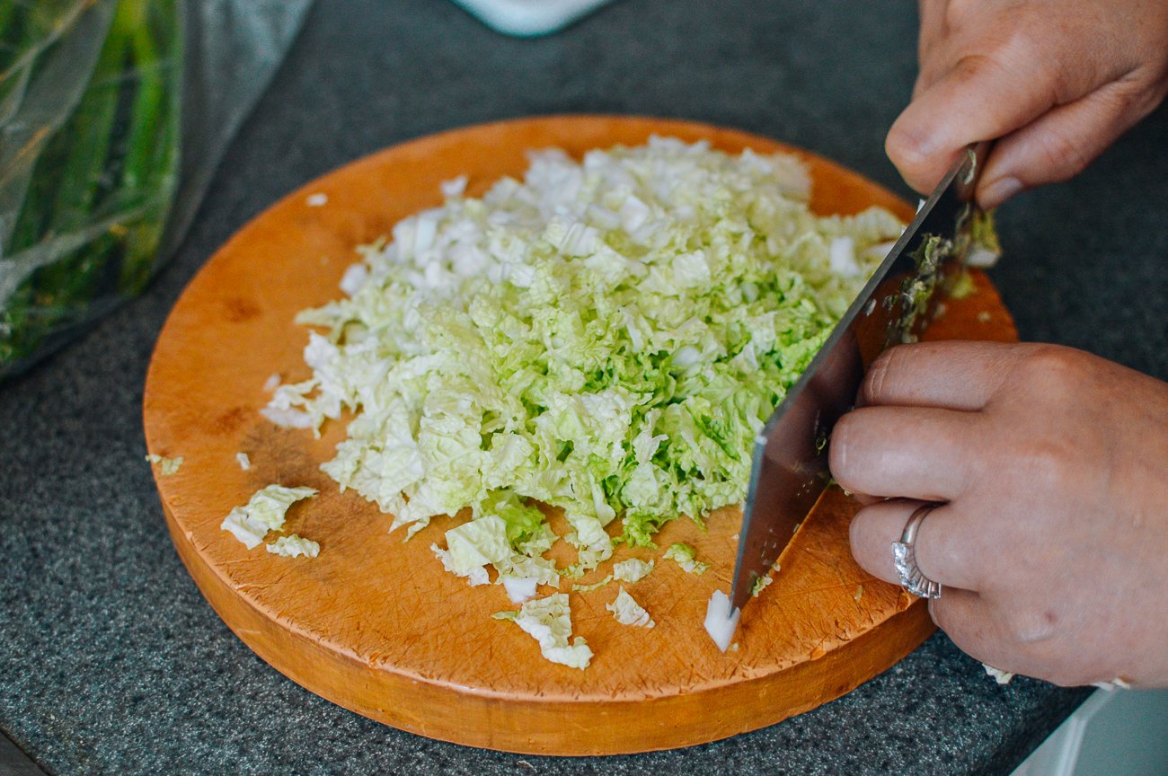 chopping napa cabbage with Chinese cleaver