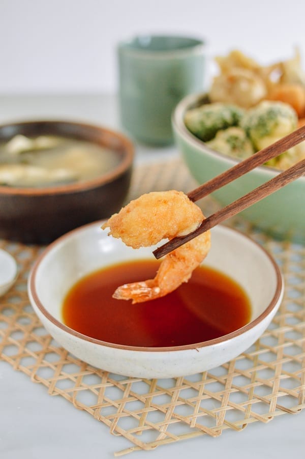 Dipping shrimp tempura into dipping sauce, thewoksoflife.com