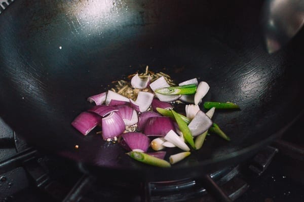 Onions, scallions, and ginger in wok, thewoksoflife.com