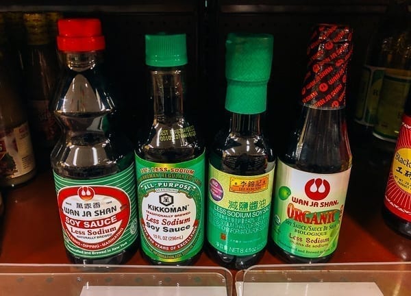 Brands of low sodium soy sauce on store shelf, thewoksoflife.com