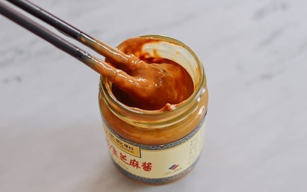 Stirring jar of Chinese sesame paste, thewoksoflife.com