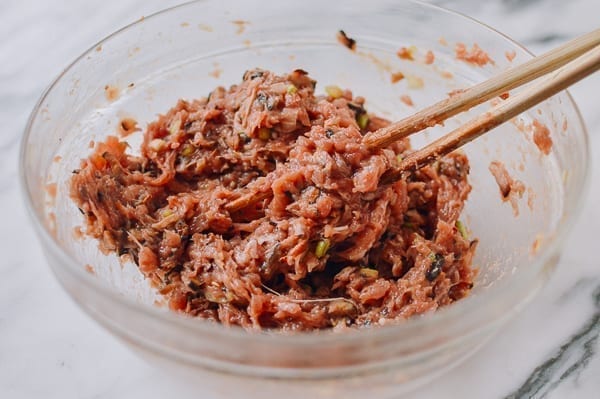 Meat filling with added cooked shiitake mushrooms, thewoksoflife.com