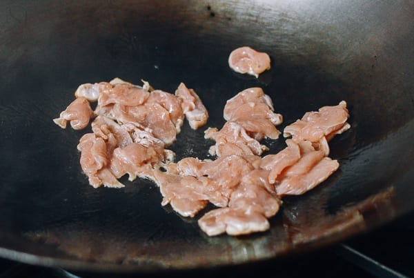 Searing chicken in wok, thewoksoflife.com