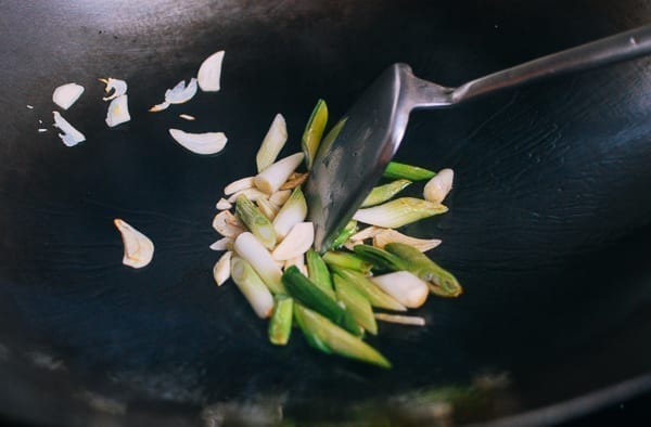Scallion whites and garlic in wok, thewoksoflife.com