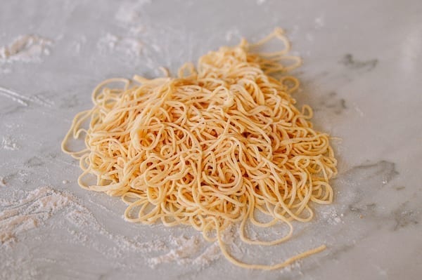 Thin noodles tossed in flour, thewoksoflife.com