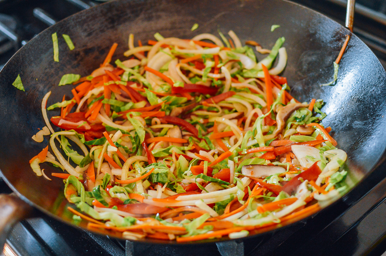 sliced vegetables in wok