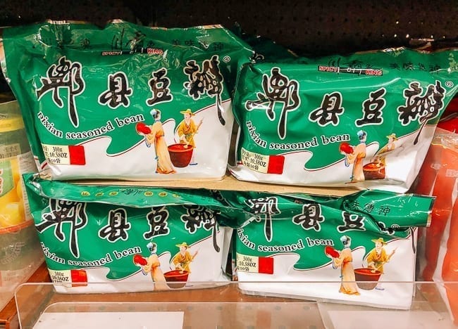 Packets of doubanjiang spicy broad bean paste, thewoksoflife.com