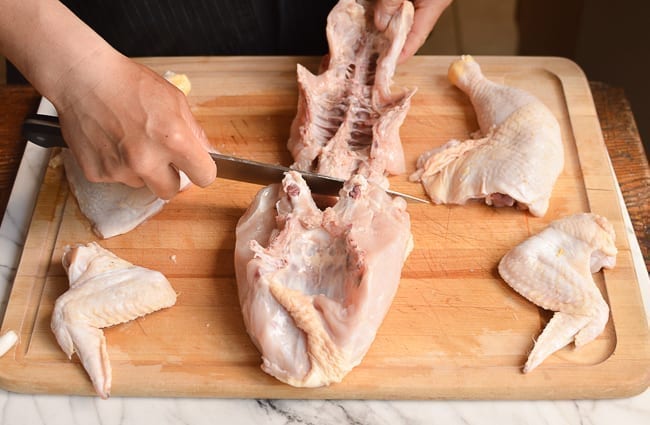 separating chicken breast from backbone