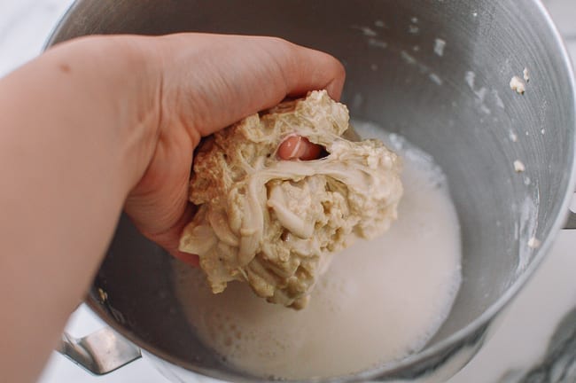Squeezing dough between fingers to remove excess starch, thewoksoflife.com