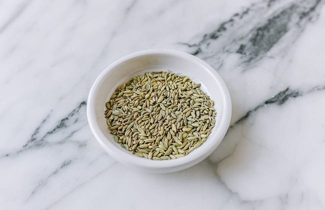 Fennel seeds in white dish