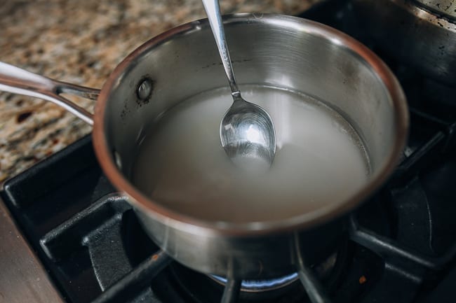 Dissolving sugar into water over heat, thewoksoflife.com