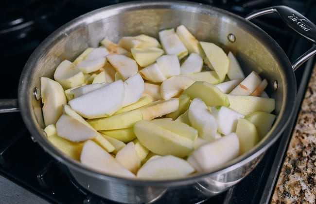 Cooking sliced apples in butter in skillet, thewoksoflife.com