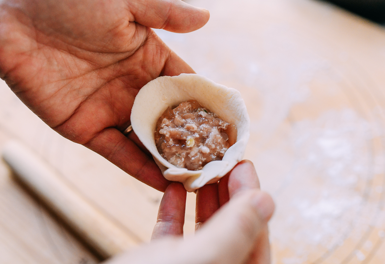 Pleating shengjian mantou, thewoksoflife.com