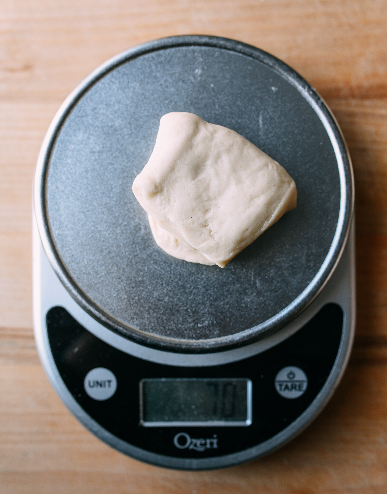 Weighing dough into equal pieces