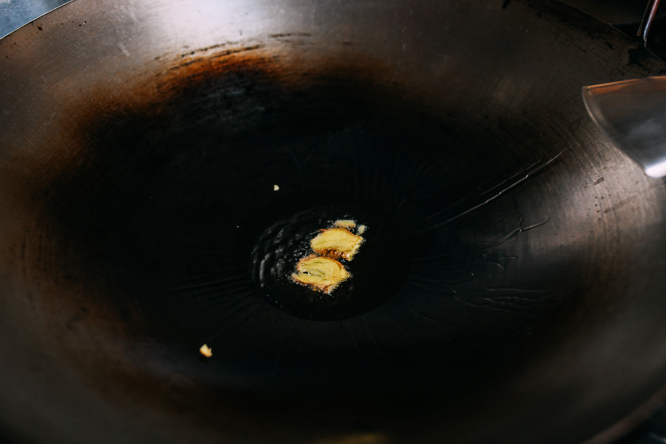 Ginger in oiled wok