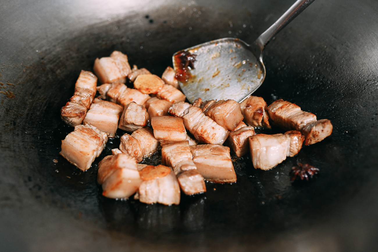 Lightly browned pieces of pork belly