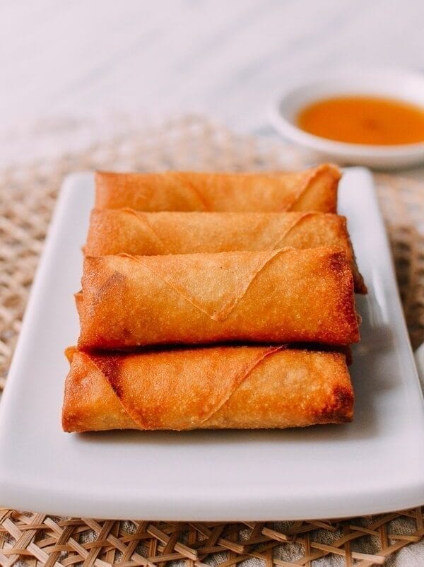 Fried spring rolls on white plate
