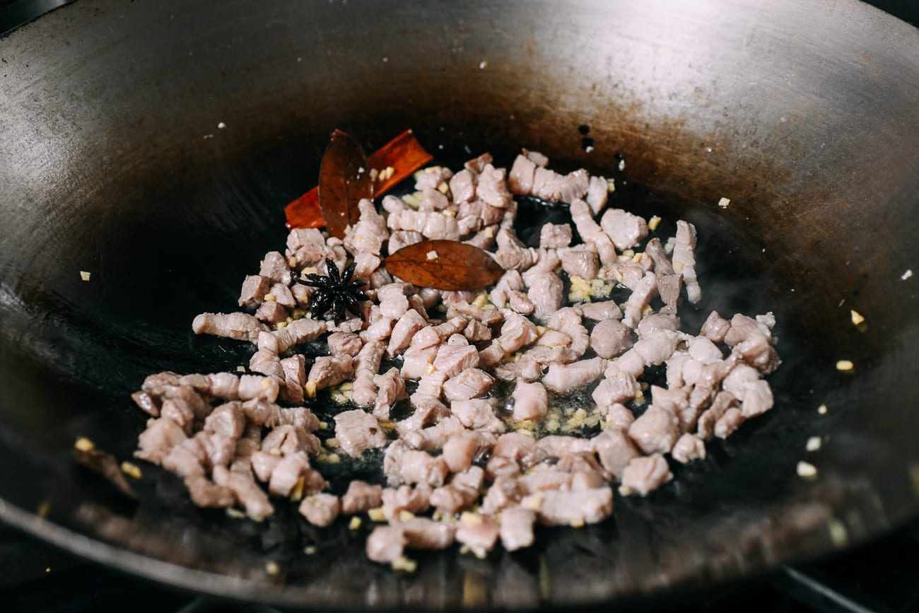 Cooking pork pieces in oil