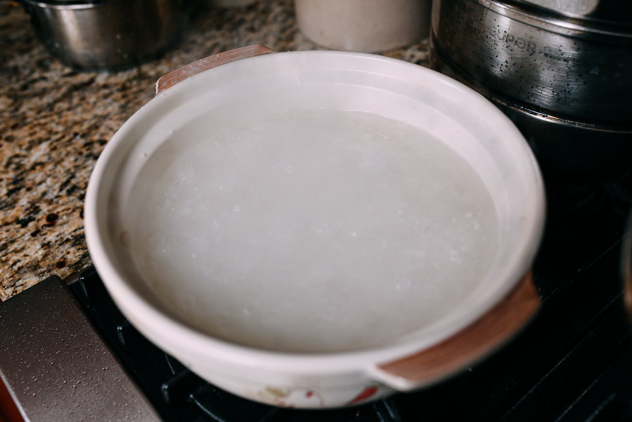 Rice and stock/water in pot